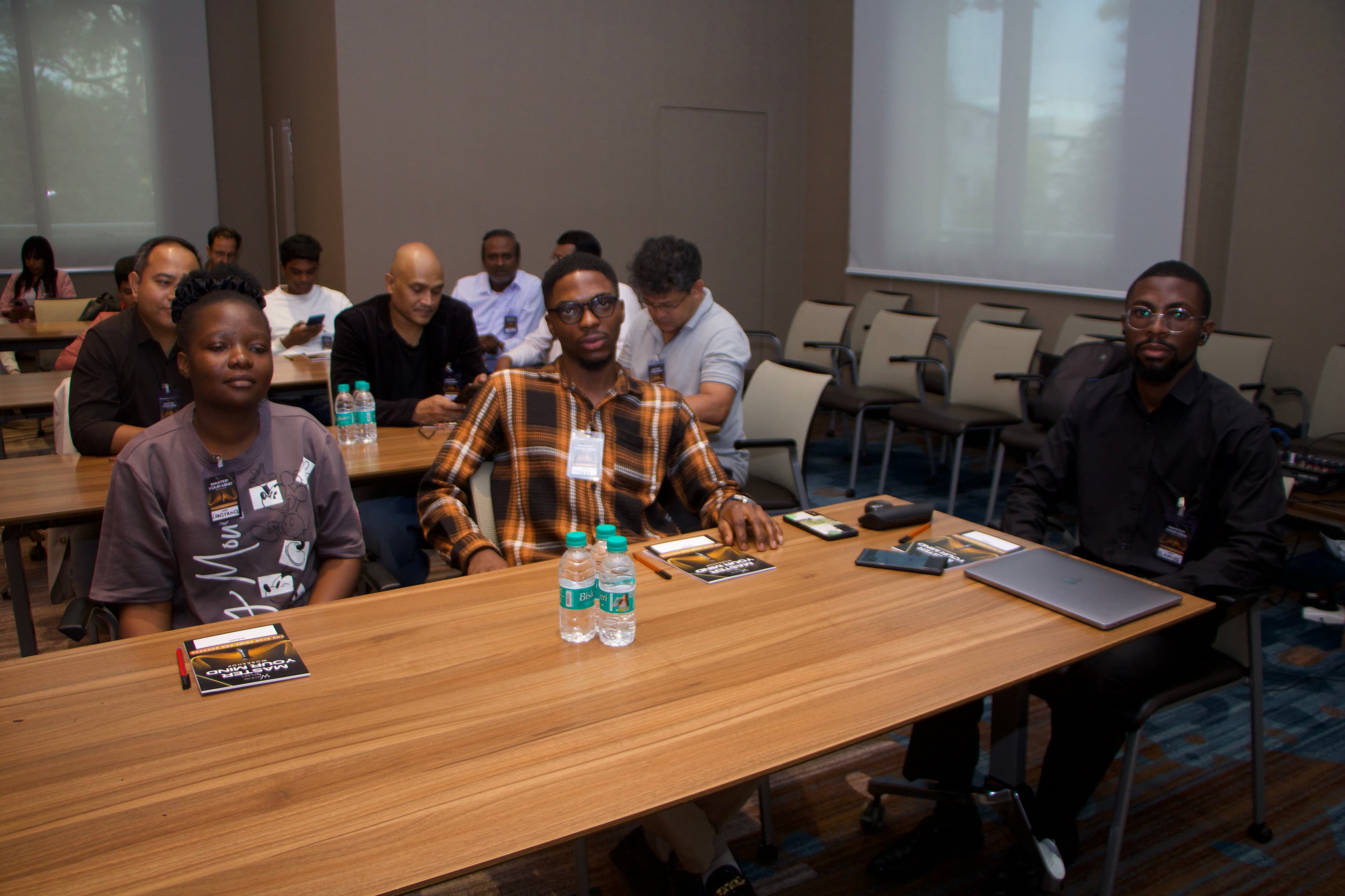 Participants seated and attentive during a TRANSFORM session